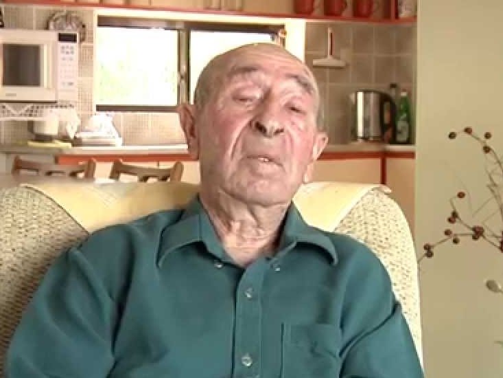 Grandpa Aryeh telling his story in his armchair at home